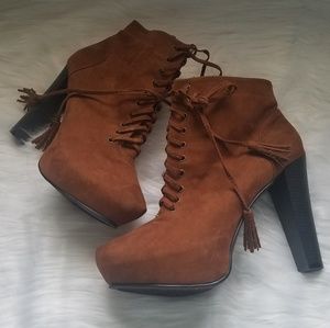 Platform heel laced up booties